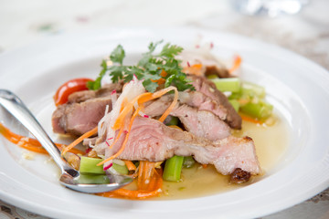 Roasted pork salad with Spicy sauce Thai traditional cuisine