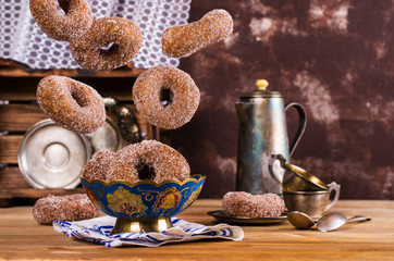 Obraz na płótnie Canvas Donuts with sugar and cinnamon