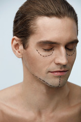 Obraz premium Plastic Surgery. Portrait Of Handsome Man With Lines On Face