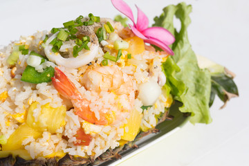 rice with seafood in a pineapple