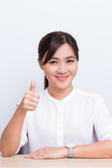 Asian woman show thumb up