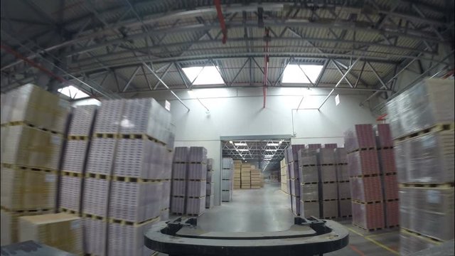Camera on Truck Moves in Storehouse in Alabuga