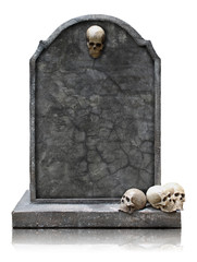 Tombstone with skull isolated with clipping path. - obrazy, fototapety, plakaty
