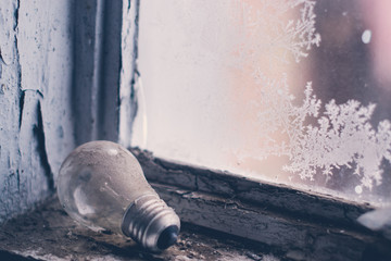 Old lamp on windowsill
