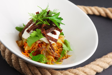 Authentic salad with bean, cabbage and pickled cucumber