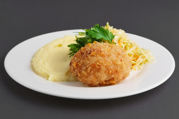 Chicken Kiev cutlet with mashed potato