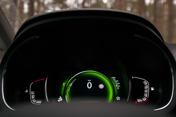 Speedometer, tachometer and odometer. Modern car dashboard. Eco driving.