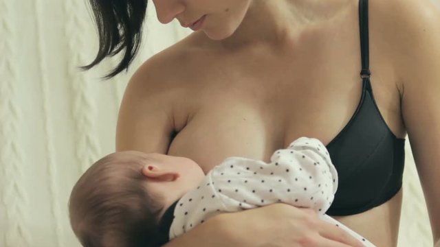 Mother breastfeeding her baby