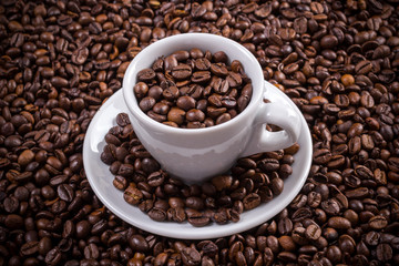 Coffee cup with coffee beans