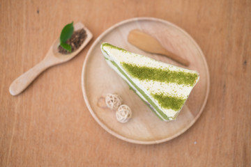Slice of Matcha green tea cake cheesecake