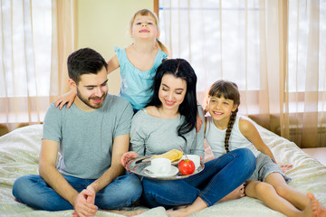 family breakfast in the hotel room