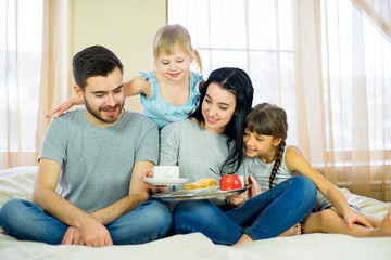 family breakfast in the hotel room
