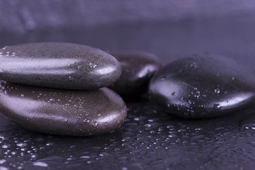 black stones covered by rain drops