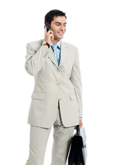 businessman with cellphone and briefcase