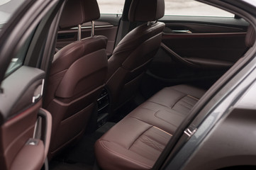 Rear leather seats in the luxury car.