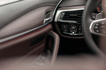 Naklejka premium Luxury car interior. Leather and wood.