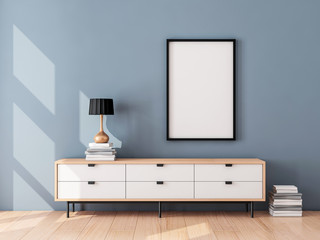 Black Poster Frame Mockup hanging on the blue wall, modern bureau with Table lamp and books. 3d rendering