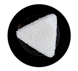 White rice triangle shape in black ceremic dish isolated on white background, clipping path included