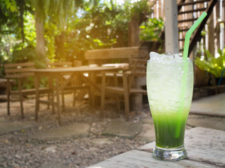 wood table with Drinking herbal at natural park.