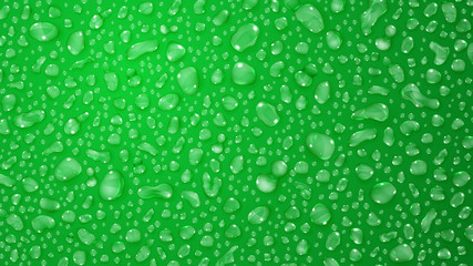 Green background of water drops