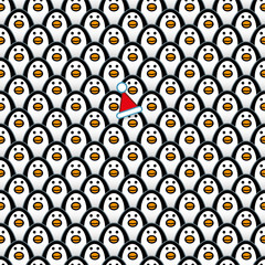 Penguin Wearing Red Santa Hat in a crowd of Penguins
