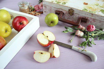 Group of red and yellow apples on the lili background