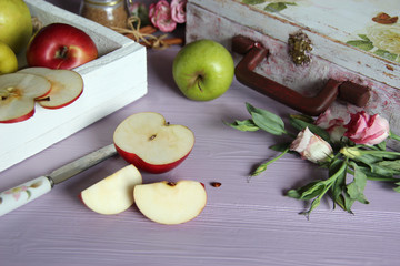 Group of red and yellow apples on the lili background