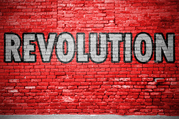 Fototapeta premium Revolution Ziegelsteinmauer Graffiti