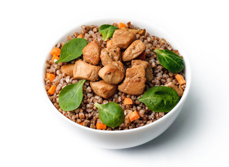buckwheat with meat and vegetables isolated on white background