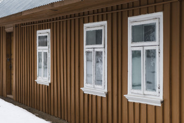 The front of the old traditional Ukrainian house, in the village, at an angle