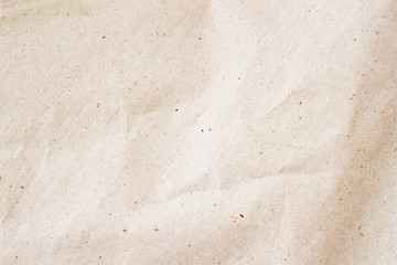 Environmental or craft paper texture background close-up. Grunge old paper surface texture. For modern pattern, wallpaper or banner design. With place for your text