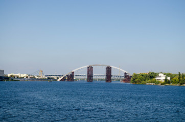 large iron bridge on the river