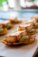 Crushed banana with cheese and avocado