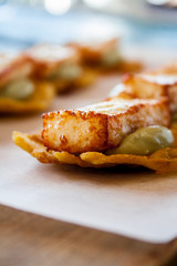 Crushed banana with cheese and avocado