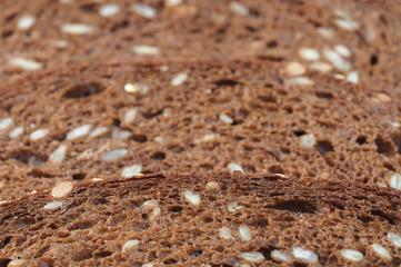texture with sliced rye bread. Close-up food photography.