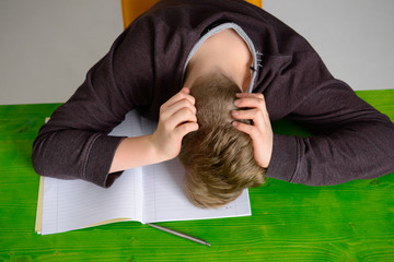 teenage boy doing homework