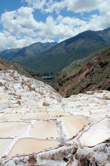 Terraced salt pans also known as "Salineras or Salinas de Maras", in the Andes Mountains in Cusco, Peru.