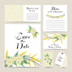 Wedding invitation decorated with mimosa and spring flowers.