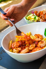 Italian pennes food dish with shrimps