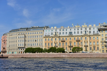 Fototapeta na wymiar Houses on Neva river in St. Petersburg. Russia.