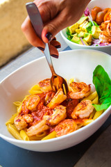 Italian pennes food dish with shrimps