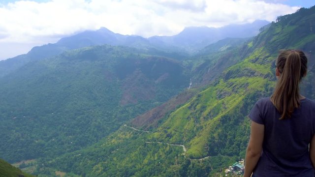 Female Traveler Enjoying View in Sri Lanka from Litte Adam's Peak