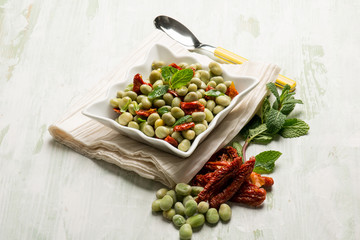 broad beans salad with dried tomatoes and mint