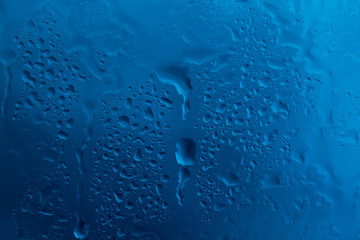 Drops of rain on glass