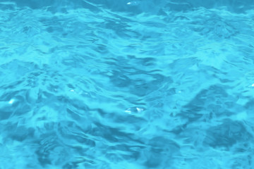 Fototapeta na wymiar Rippled blue water in swimming pool background