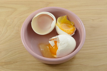 Freezer burned frozen rotten eggs in bowl