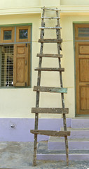 old ladder against temple wall in Bangkok