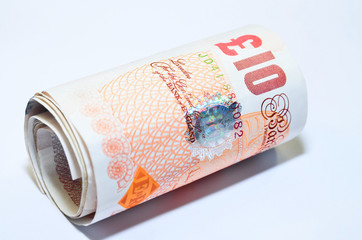 British banknotes rolled..