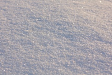 White snow on background.
