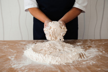 Chef preparing dough - cooking process